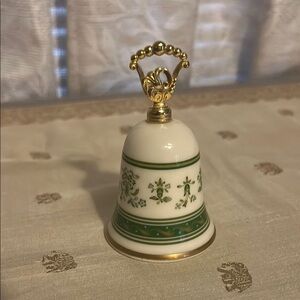 Gorham Fine China Porcelain Bell 
The Danbury Mint
3.75” x 2.5”
